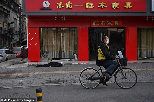  People are suddenly collapsing in the streets in Wuhan. Virus experts  complain that Wuhan authorities didn't act soon enough. But local  officials don't dare move unless given the go-ahead by Communist  dictator Xi Jin-ping