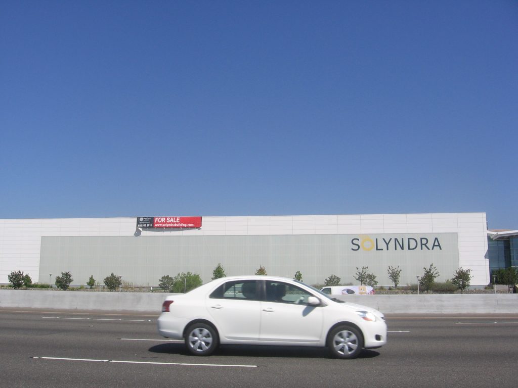 A large factory building owned by Solyndra in Fremont, California, USA with a "For Sale" sign on it, one of a number of costly industrial policy failures by the Obama administration. The Obama Energy Department sank over half a billion dollars in the solar energy company. The company’s major private investors were campaign supporters of Mr. Obama. In 2011, after spending millions on wasteful perks and misstating its financial position, Solyndra went bankrupt. Without warning amidst a recession, one thousand employees lost their jobs.