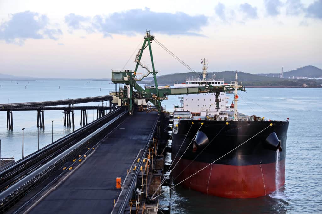 Shown: a terminal for loading coal cargoes in Port Gladstone, Australia. China is boycotting Australian barley and coal in an attempt to punish Australia for resisting China's aggressive moves in the Pacific. But China's attempt to punish Australia may be backfiring as international resistance to China grows.