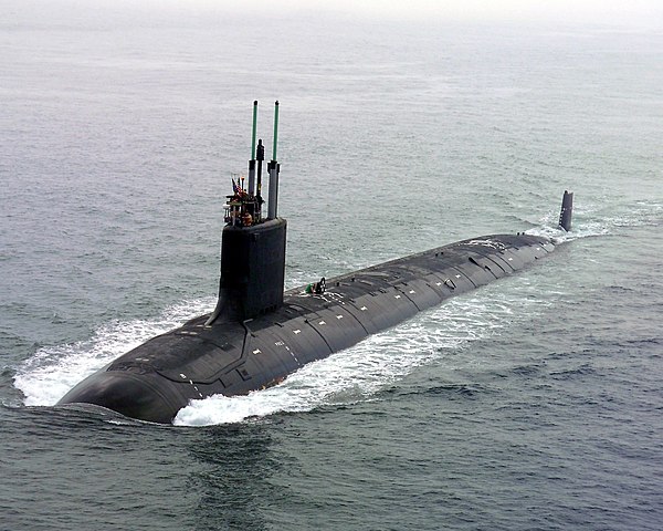 The USS Virginia, the first of a class of US nuclear-powered attack submarines that take their name from this first exemplar built in 2004. The entire US submarine fleet is nuclear, enhancing stealth, range, and time between port calls. Australia will now acquire and build its own nuclear submarine fleet to enhance deterrence and protect its sea lanes, through a coveted technology-sharing arrangement with the US and UK. The announcement of the alliance, abbreviated AUKUS, has upset China, whose hostile activities against Australia and other Pacific nations provoked the defensive move by the three allies. China is trying now to make nice with its regional neighbors by applying to join the CPTPP, a strategically important trade pact that the US has foolishly boycotted, despite once helping to found.