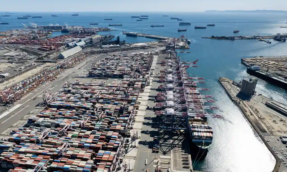 Amid nationwide shortages and shortage-driven price increases, ships and containers wait for docking and truck pickup at the Port of Long Beach, California, second largest port in the US. 