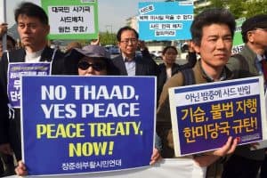 South Korean protesters hold placards during a rally against the deployment of the US Terminal High Altitude Area Defense (THAAD) system near the US embassy in Seoul on April 28, 2017. Seoul on April 28 brushed aside US President Donald Trump's suggestion it should pay for a $1 billion missile defence system the two allies are installing in South Korea to guard against threats from the North. (JUNG YEON-JE/AFP/Getty Images)